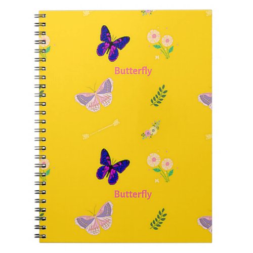 Butterfly pattern on yellow notebook