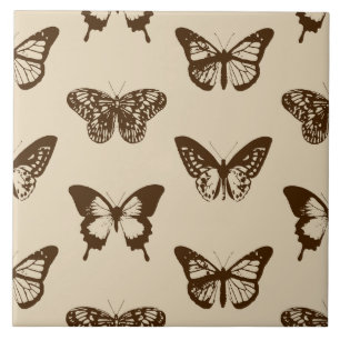 Butterfly sketch, chocolate brown on beige tile