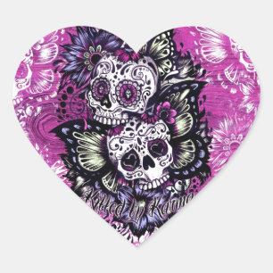 Butterfly sugar skulls on pink wood base. heart sticker