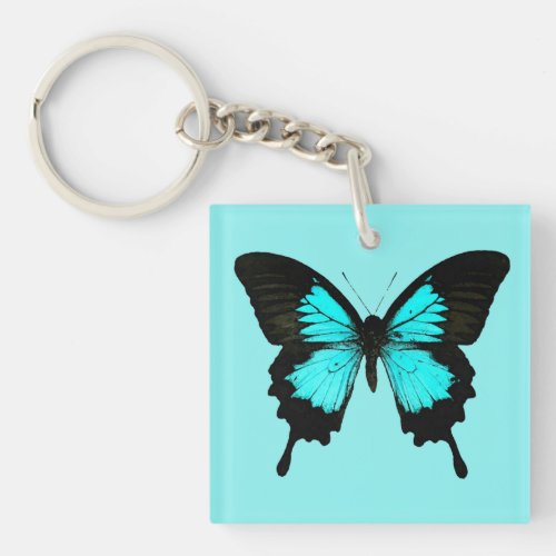 Butterfly _ turquoise blue and black keychain