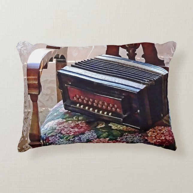 Button Accordion on Chair With Flowered Seat Accent Pillow (Front)