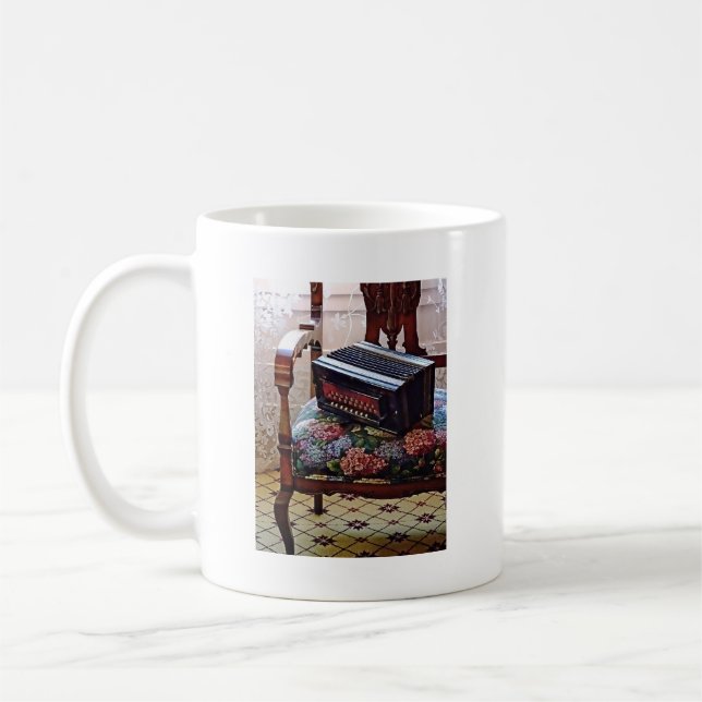 Button Accordion on Chair With Flowered Seat Coffee Mug (Left)