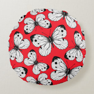 Cabbage butterfly pattern on red round pillow