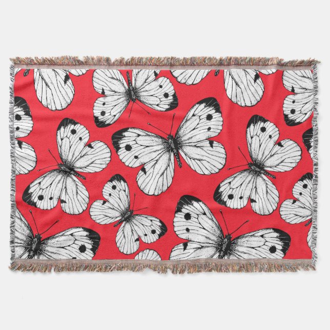 Cabbage butterfly pattern on red throw blanket (Front)