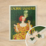 Cachou Lajaunie | Leonetto Cappiello Jigsaw Puzzle<br><div class="desc">Cachou Lajaunie (1920) | Leonetto Cappiello’s 1920 advertising poster for Cachou Lajaunie showcases a striking image of a red-haired woman dressed in a bold red and yellow gown, elegantly smoking against a rich dark green background. The vibrant colors and dynamic pose of the woman immediately capture attention, reflecting Cappiello’s signature...</div>