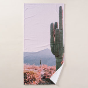 CACTUS PLANT BESIDE ORANGE LEAFED PLANT BATH TOWEL