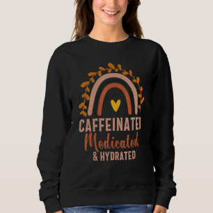 Caffeinated Medicated Hydrated  Saying Nurse Sweatshirt