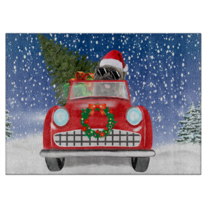 Cairn Terrier Dog Driving Car In Snow Christmas Cutting Board