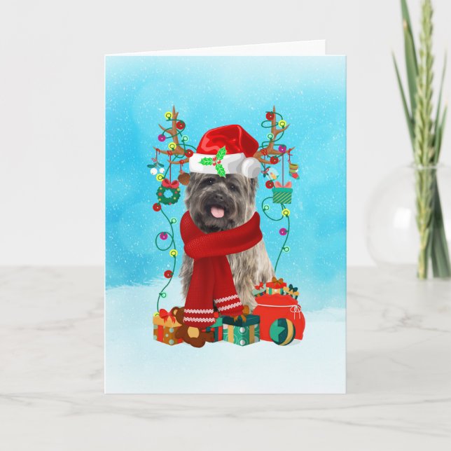 Cairn Terrier in snow with Christmas gifts Card (Front)