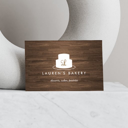 Customizable Cake Monogram Logo in White on Brown Woodgrain Business Card Templates