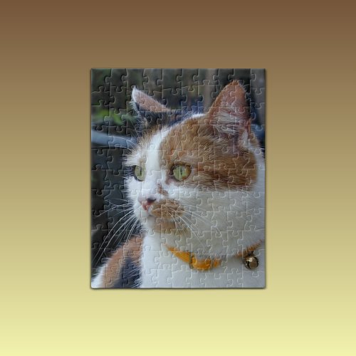 Calico cat close up in the garden jigsaw puzzle