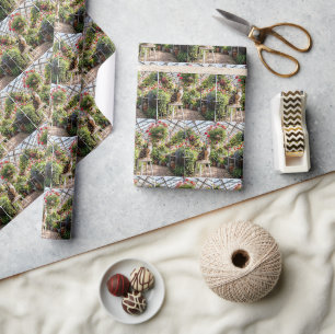 Calico Cat on a Stool in a Greenhouse Wrapping Paper
