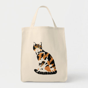 Calico cat sitting tote bag