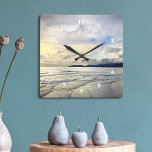 California Pismo Beach Dramatic Cloud Sunset Photo Square Wall Clock<br><div class="desc">This dramatic coastal Pismo Beach, California, wide, pristine, sandy beach landscape, taken close to sunset exudes peacefulness and solitude. Here you’ll find the surfers waiting for the perfect wave as well as the small birds searching for their evening snack. Recall memories of summer whenever you check the time on this...</div>