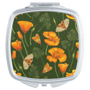 California poppies and moths on dark green compact mirror