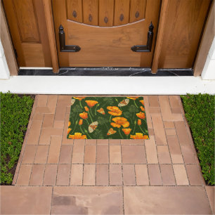 California poppies and moths on dark green doormat