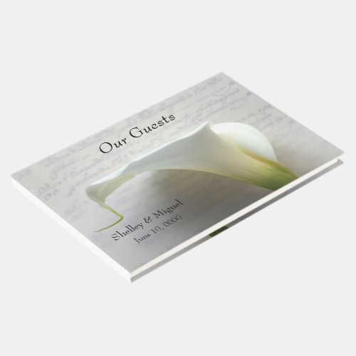 Calla lily on old hand script guest book