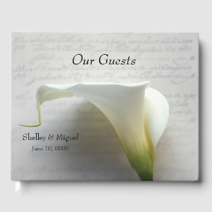 Calla lily on old hand script guest book