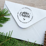 Calligraphy Lettering Merry Christmas Address Rubber Stamp<br><div class="desc">Merry Christmas in calligraphy script lettering with decorative accent elements of holly leaf and berry and your return address in a circular lettering rubber stamp.</div>