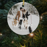 Calligraphy Merry Christmas Photo Ceramic Ornament<br><div class="desc">Celebrate the magic of the season with a personalized Christmas ceramic ornament that beautifully captures your memories! Featuring the festive greeting "Merry Christmas" in modern brush calligraphy, this ornament overlays your favorite photo, creating a heartfelt keepsake for your tree. On the back, you can add another cherished photo, making it...</div>