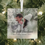 Calligraphy Our First Christmas Couple Photo Glass Ornament<br><div class="desc">Elegant Calligraphy Script Our First Christmas Couple Photo Heart Ornament</div>