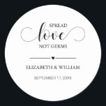 Calligraphy Spread Love Not Germs Hand Sanitizer Classic Round Sticker<br><div class="desc">Modern and elegant design printed Black Calligraphy Spread Love Not Germs Hand Sanitizer Sticker that can be customized with your text. Personalize it with your couple name and your date! Please click the "Customize it" button and use our design tool to modify this template. Check out the Graphic Art Design...</div>