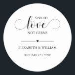 Calligraphy Spread Love Not Germs Hand Sanitizer Classic Round Sticker<br><div class="desc">Modern and elegant design printed Black Calligraphy Spread Love Not Germs Hand Sanitizer Sticker that can be customized with your text. Personalize it with your couple name and your date! Please click the "Customize it" button and use our design tool to modify this template. Check out the Graphic Art Design...</div>
