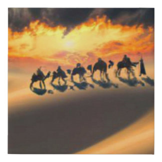 Camel train crossing the desert faux canvas print