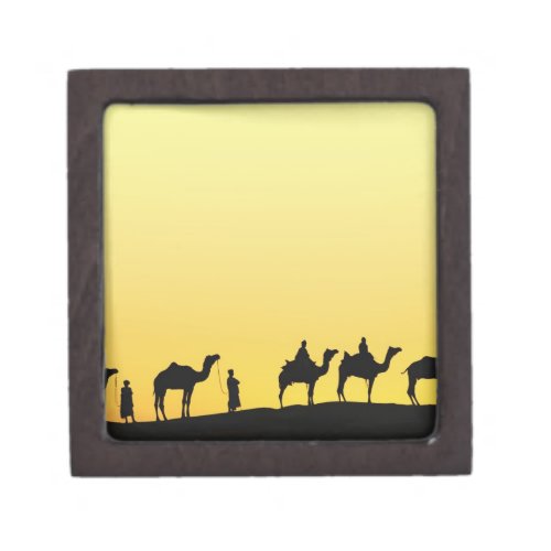 Camels and camel driver silhouetted at sunset 3 gift box