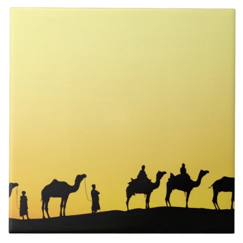 Camels and camel driver silhouetted at sunset 3 tile