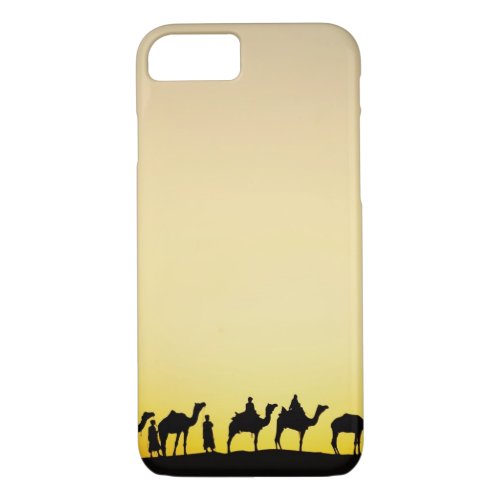 Camels and camel driver silhouetted at sunset 4 iPhone 87 case