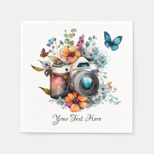 Camera on a bouquet with a butterfly napkins