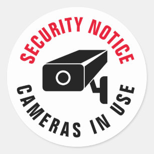 Camera in use surveillance warning red security door sign