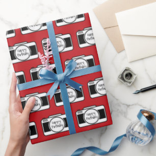 Camera with Birthday Text on Red Wrapping Paper