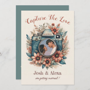 Camera with floral wedding Invitation