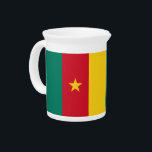 Cameroon Flag Pitcher<br><div class="desc">Pour with pride using this eye-catching pitcher adorned with the flag of Cameroon. Boldly displaying the green, red, and yellow vertical stripes with the distinctive central yellow star, this patriotic pitcher brings a vibrant splash of Cameroonian identity to any gathering, whether it's a family meal, festive celebration, or cultural event....</div>