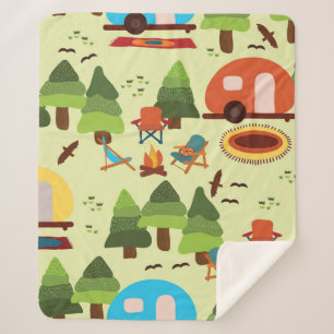 Camping scene - caravan, camping chairs, fire plac sherpa blanket