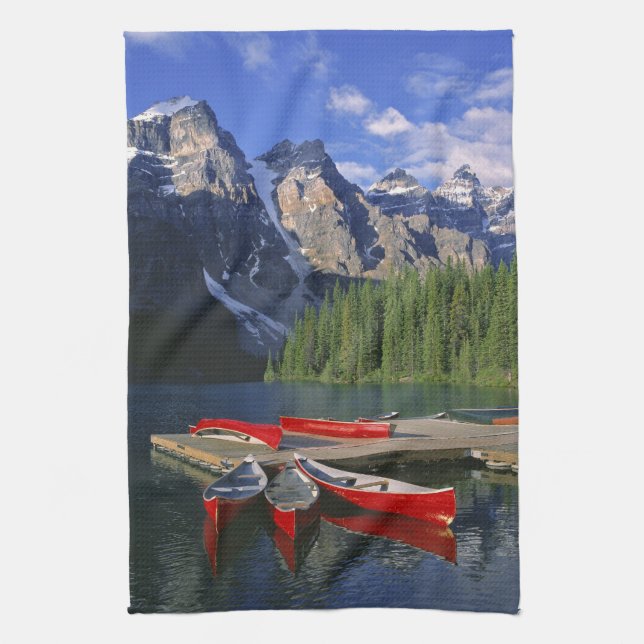 Canada, Alberta, Moraine Lake. Red canoes await Kitchen Towel (Vertical)