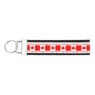 CANADA SHOOTS! CANADA SCORES!+Maple Leaf Wrist Keychain