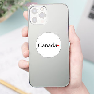 Canada typography with red maple leaf round sticker
