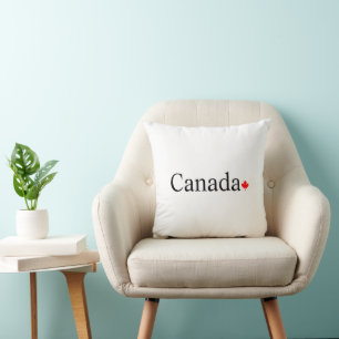 Canada typography with red maple leaf white throw pillow