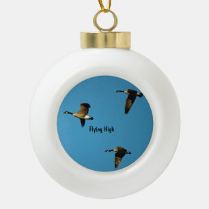 Canadian geese in flight ceramic ball christmas ornament