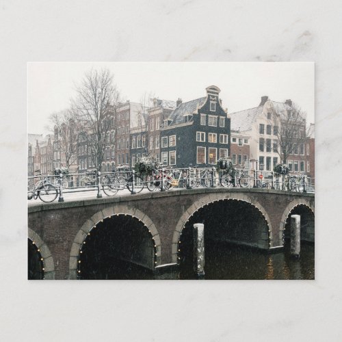 Canal in Amsterdam in winter Postcard