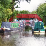 CANALS TOWEL<br><div class="desc">Canal boats, known in the UK as narrowboats, were originally used to transport goods around the country. They are now used mainly for leisure and attract people from all over the world to enjoy our rural countryside. These boats look very pretty with their brightly colored cabins, traditionally blue, red or...</div>