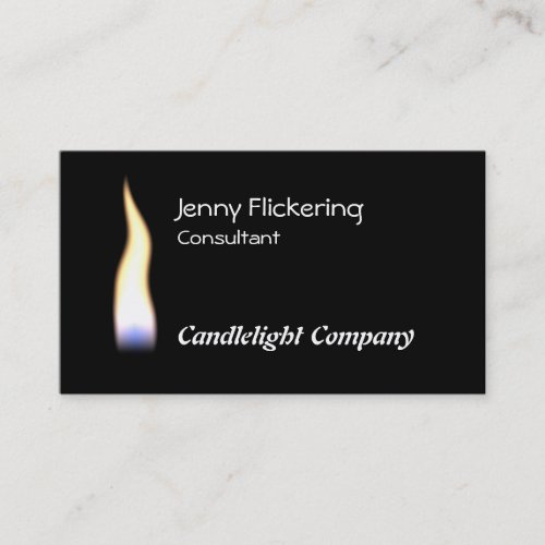 Candle flame on black business card