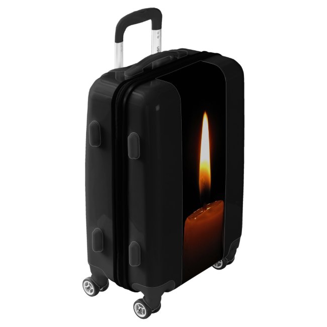 Candle Flame on Black Luggage