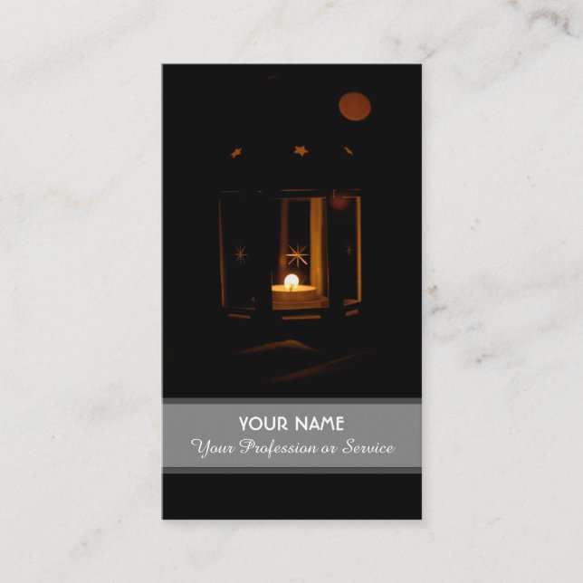 Candle light illuminates the dark business card (Front)