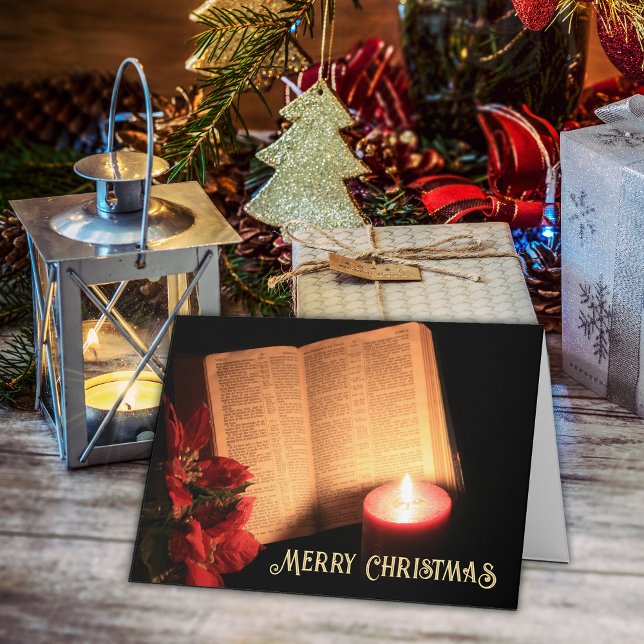 Candle Poinsettia Old Bible Holiday Card (Merry Christmas greeting card with Bible, poinsettia and votive candle.)