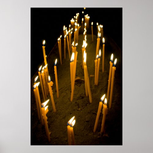 Candles lit in a church Armenia Poster