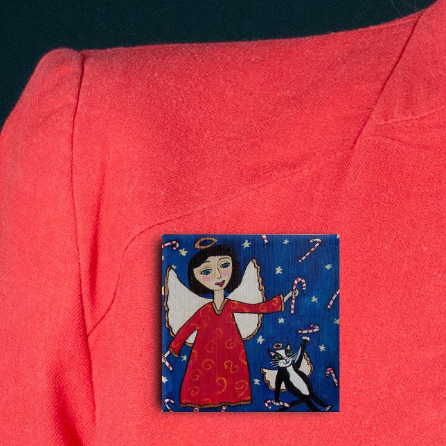 Candy Cane Angel Cat Folk Art Christmas Button (Angel in red dress floating in sky with angel cat and candy canes on Christmas pin back button.)